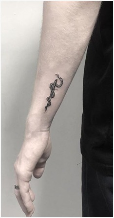 Wood Wrapping Snake Tattoo